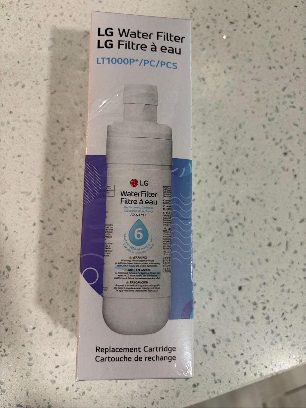 LG White Water Filter Cartridge with Blue and Purple Accents